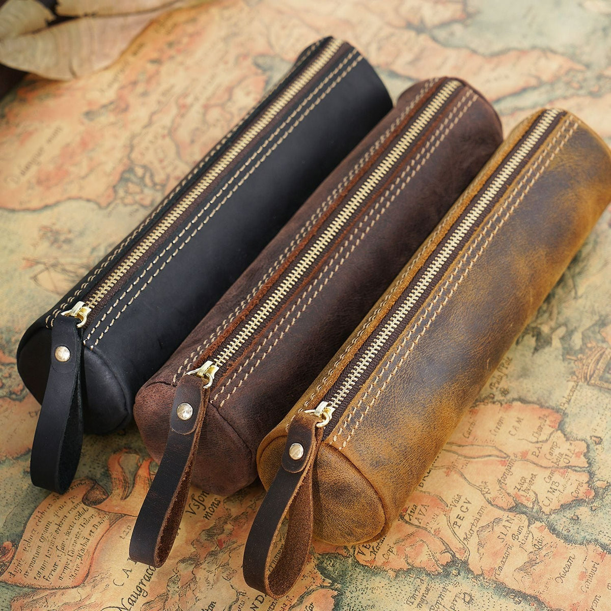 Brown leather cylinder pen case, round zip design