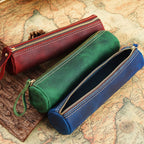 Full-grain leather pen roll holding pens upright