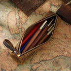 Leather cylinder case with brass zipper