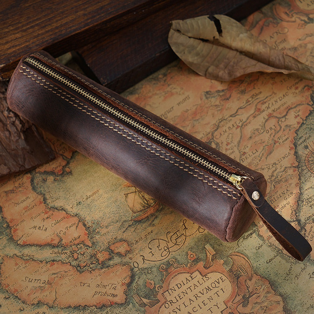 Dark brown leather cylinder pen case, round zip