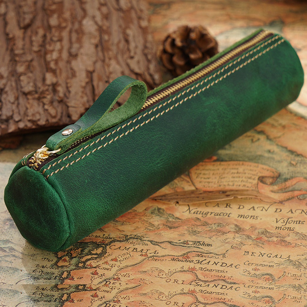Green leather cylinder pen roll with brass zipper