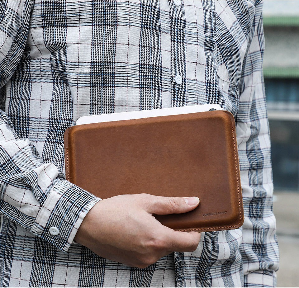 Minimalist brown leather tablet sleeve, open-top design