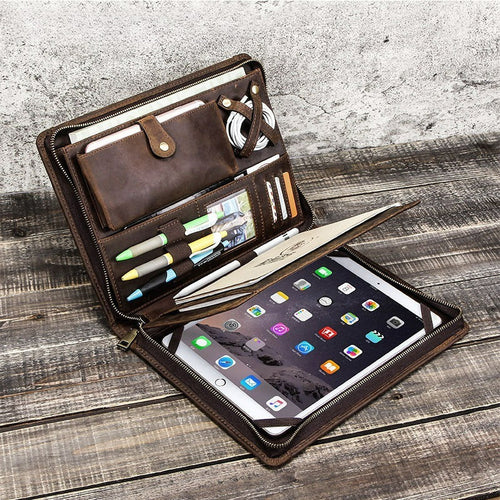 Dark brown full-grain leather iPad portfolio case with zip-around closure