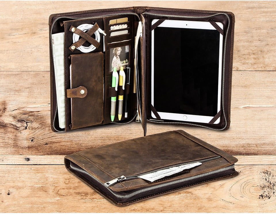 Leather iPad case with elastic strap for a charging cable