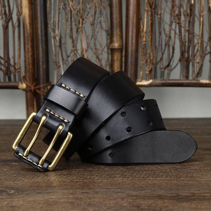 Black men's double prong leather belt — flat lay