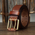 Brown men's double prong leather belt — flat lay
