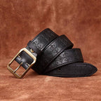 Black men's embossed leather belt — studio shot
