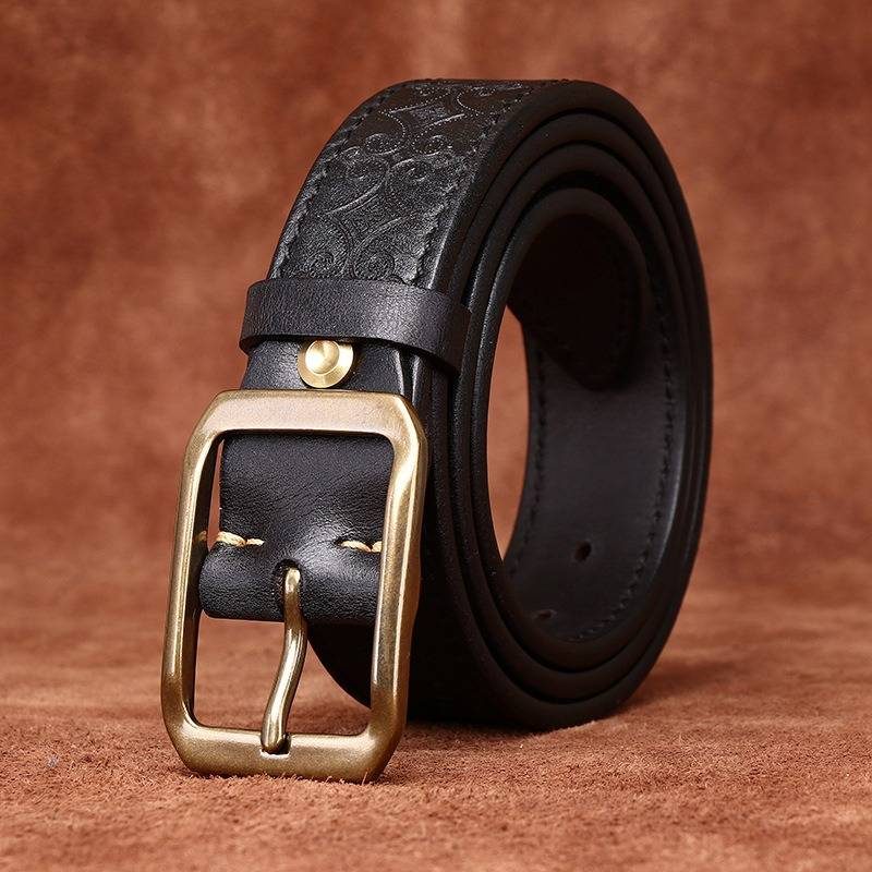 Black men's embossed leather belt — buckle detail