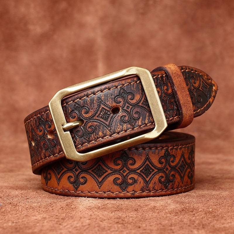 Brown men's embossed leather belt — buckle detail