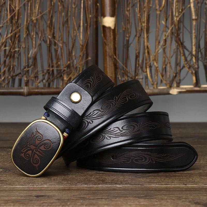 Black men's belt, scrollwork detail
