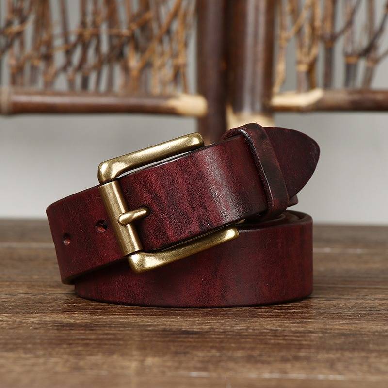Red men's jeans leather belt — buckle detail