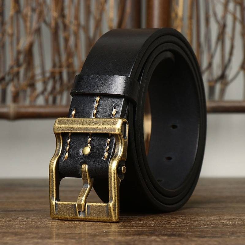 Black men's heavy duty leather belt — flat lay
