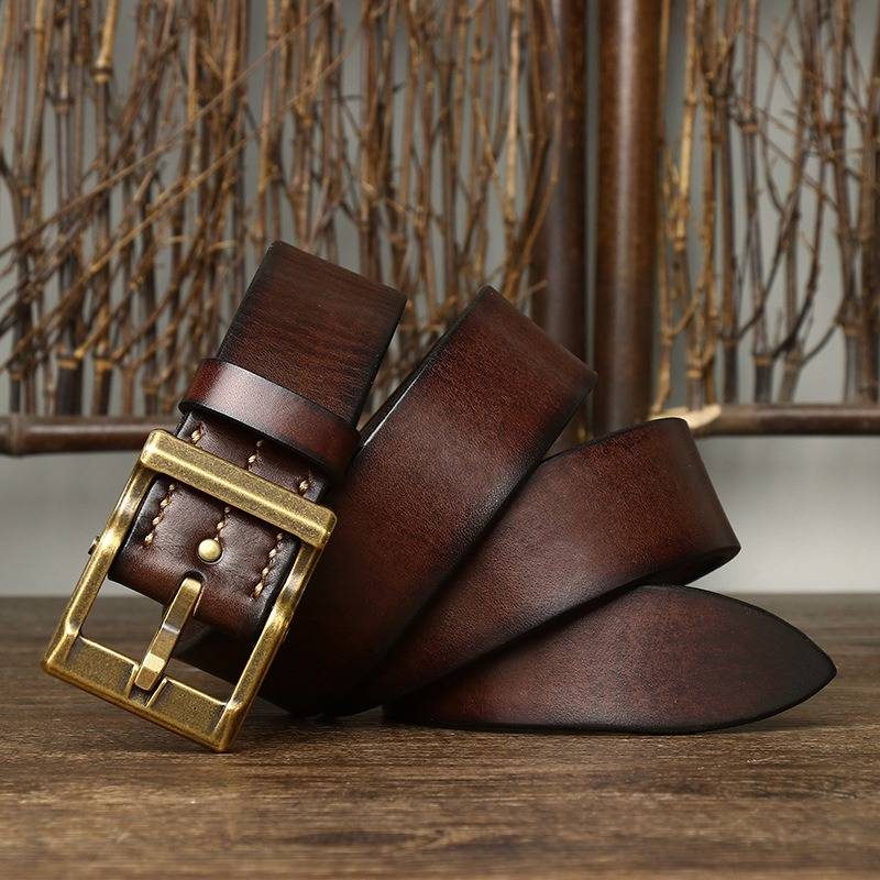 Dark brown men's heavy duty leather belt — flat lay
