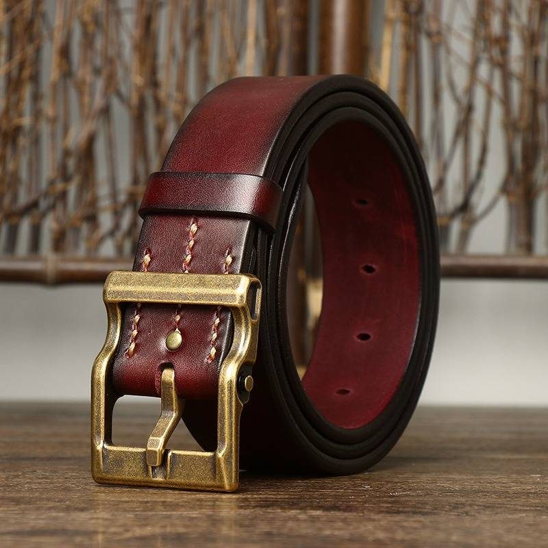 Red men's heavy duty leather belt — buckle detail