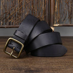 Black men's jeans leather belt — flat lay