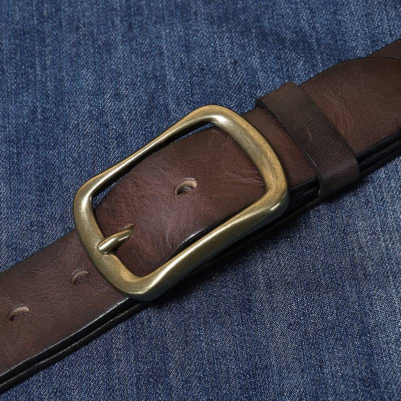 Dark brown men's jeans belt worn with denim