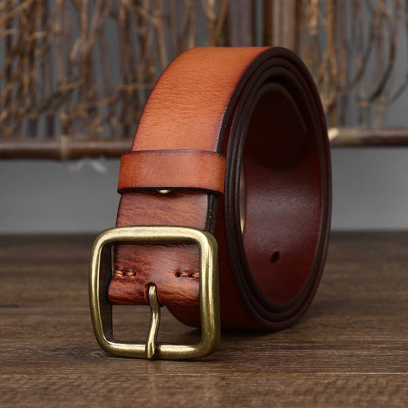 Orange-yellow men's jeans leather belt — studio shot