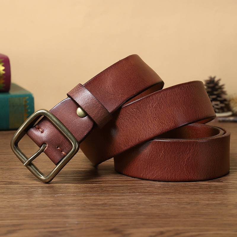 Red brown men's jeans belt worn with denim