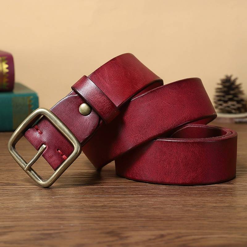 Red men's jeans leather belt — studio shot