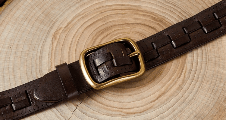 Dark brown men's belt, flat lay