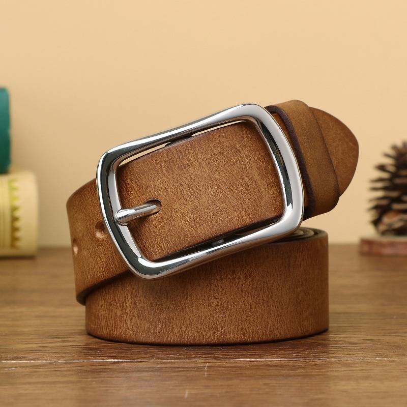 Brown full-grain men's leather belt with stainless steel buckle, coiled