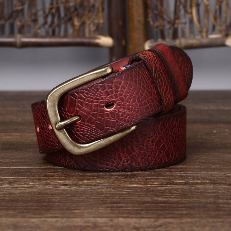 Red men's belt, coiled view
