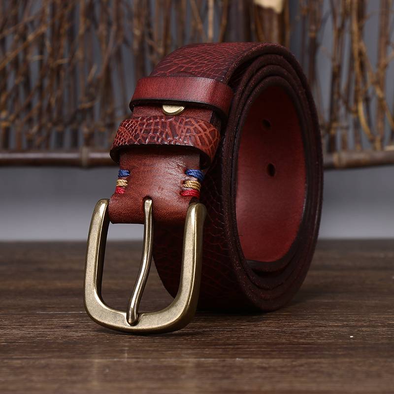 Red men's belt, buckle detail