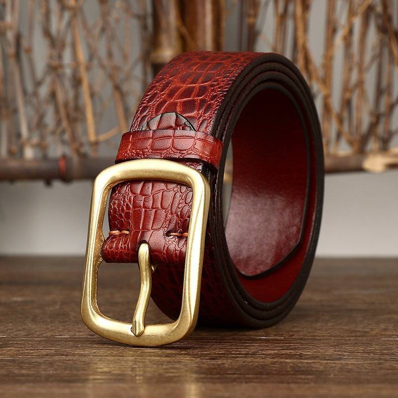 Red men's belt, buckle detail