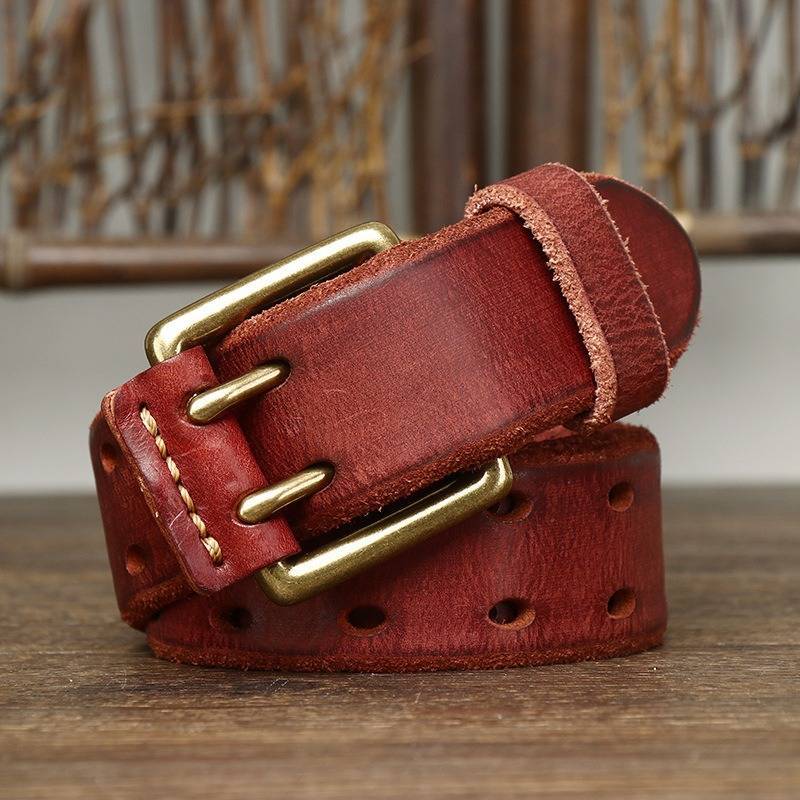 Red men's belt, buckle detail