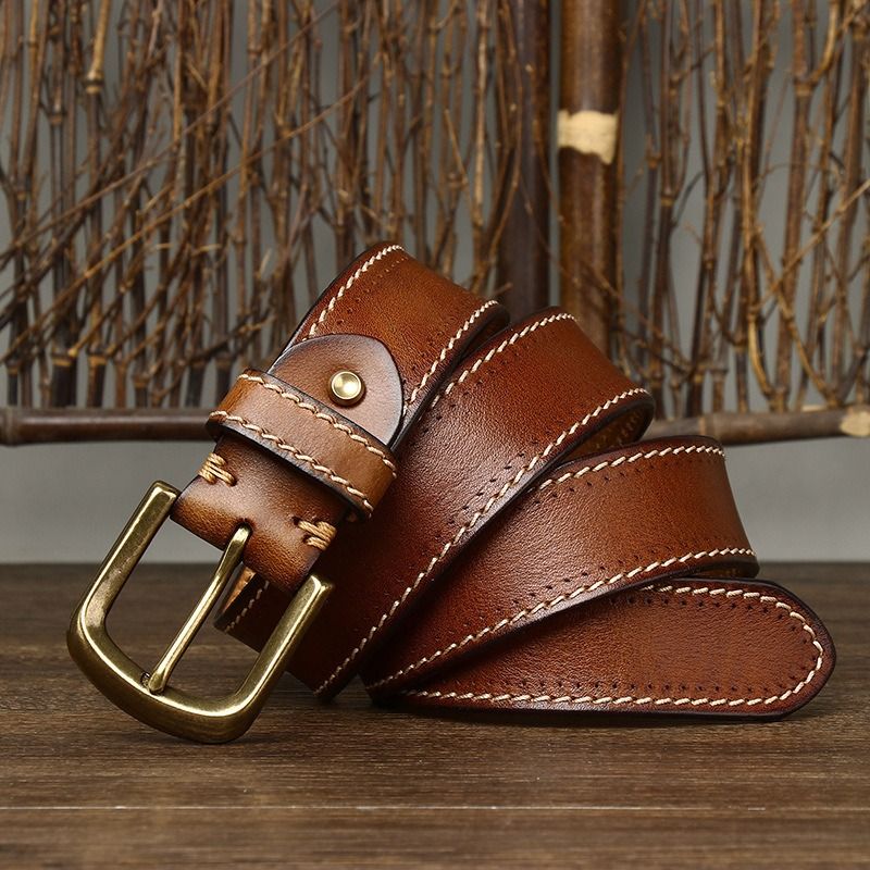 Brown men's belt, worn with jeans