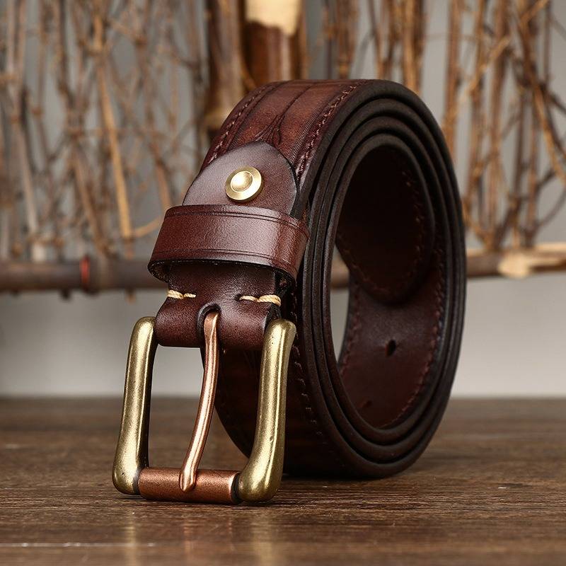 Dark brown men's belt, coiled view