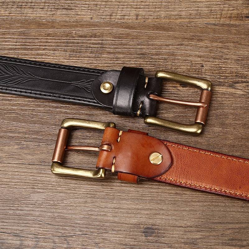 Dark brown men's belt, worn with jeans