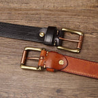 Dark brown men's belt, worn with jeans