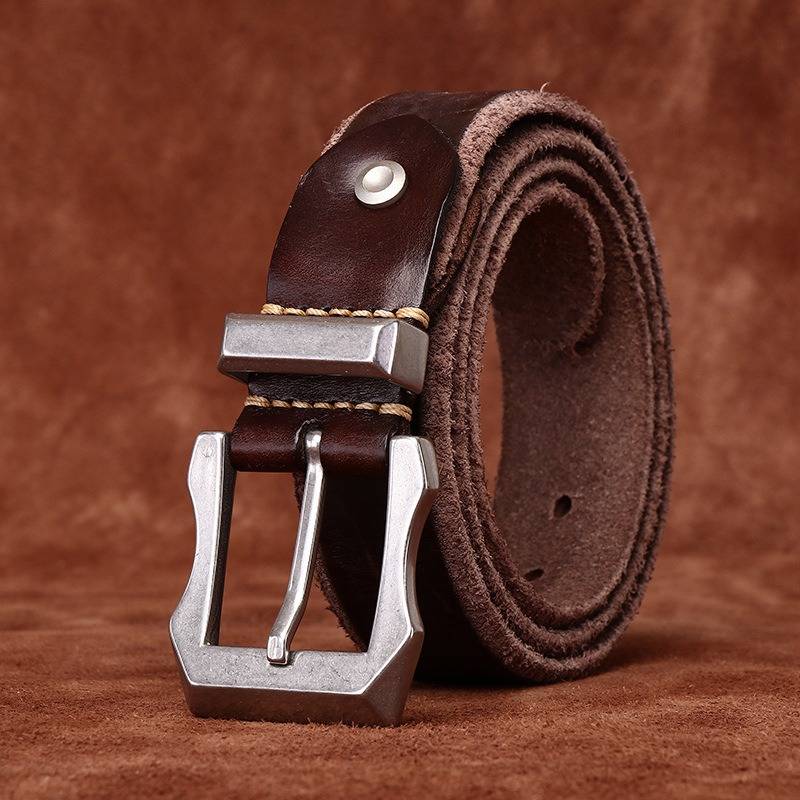 Dark brown men's belt, coiled view