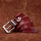 Red men's belt, coiled view