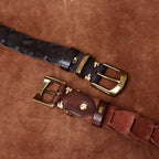 Brown men's belt, coiled view