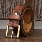 Brown men's belt, coiled view