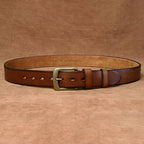Brown men's belt, tip detail