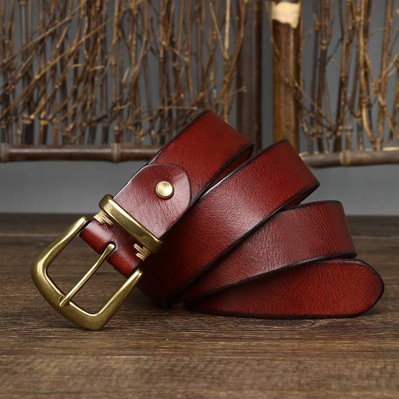 Red men's belt, buckle detail