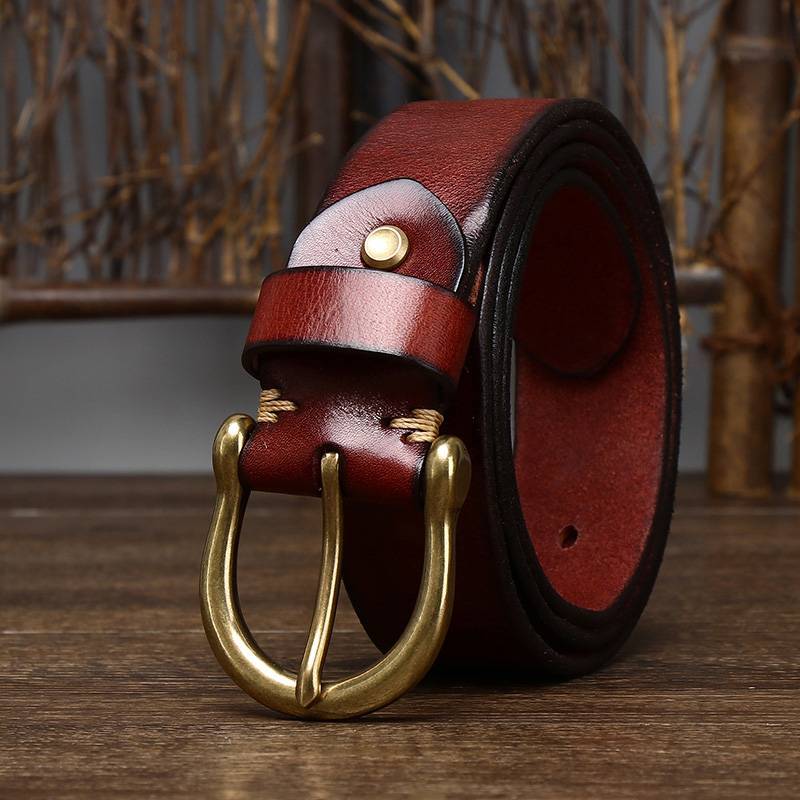 Red men's belt, buckle detail