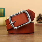 Red brown men's leather belt with stainless steel buckle close-up