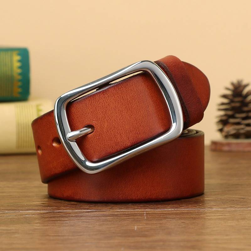 Red brown men's leather belt with stainless steel buckle close-up