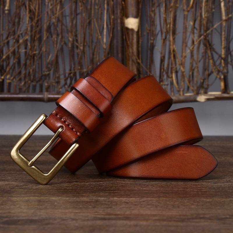 Brown men's belt, coiled view