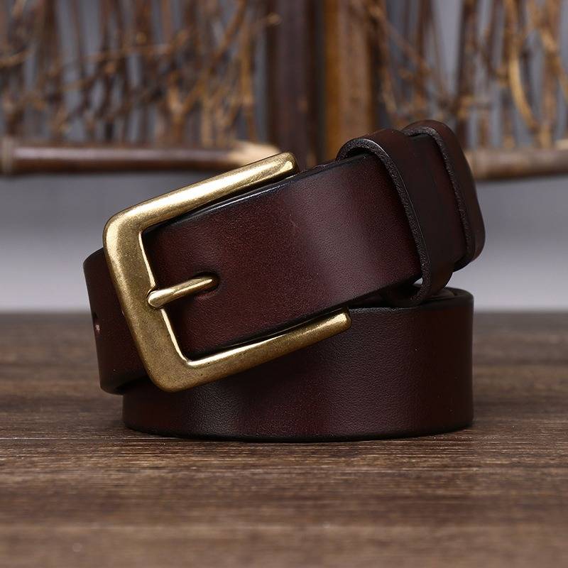 Dark brown men's belt, coiled view