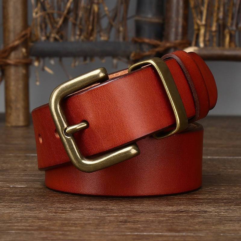 Red men's belt, buckle detail