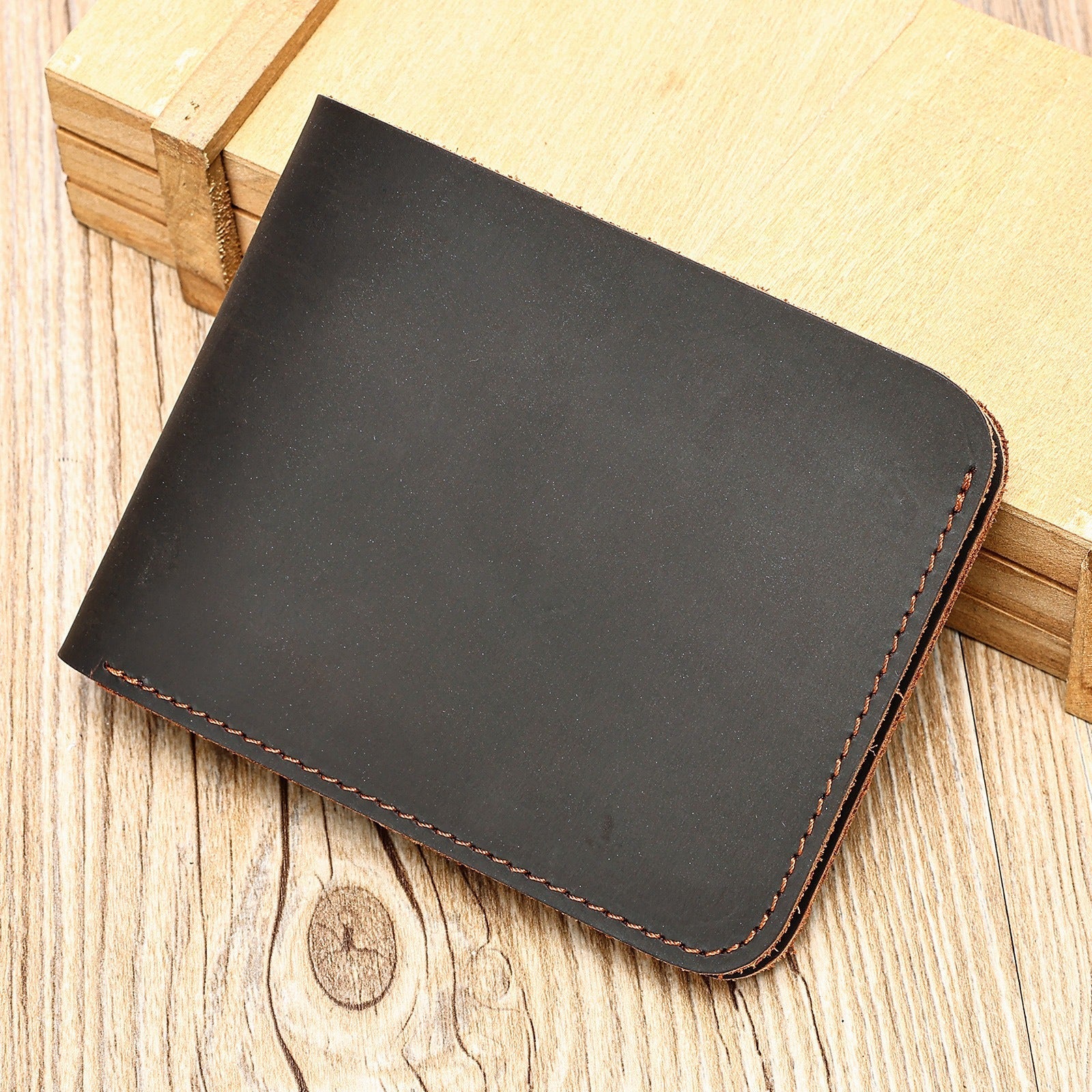 Brown-black men's wallet, closed detail
