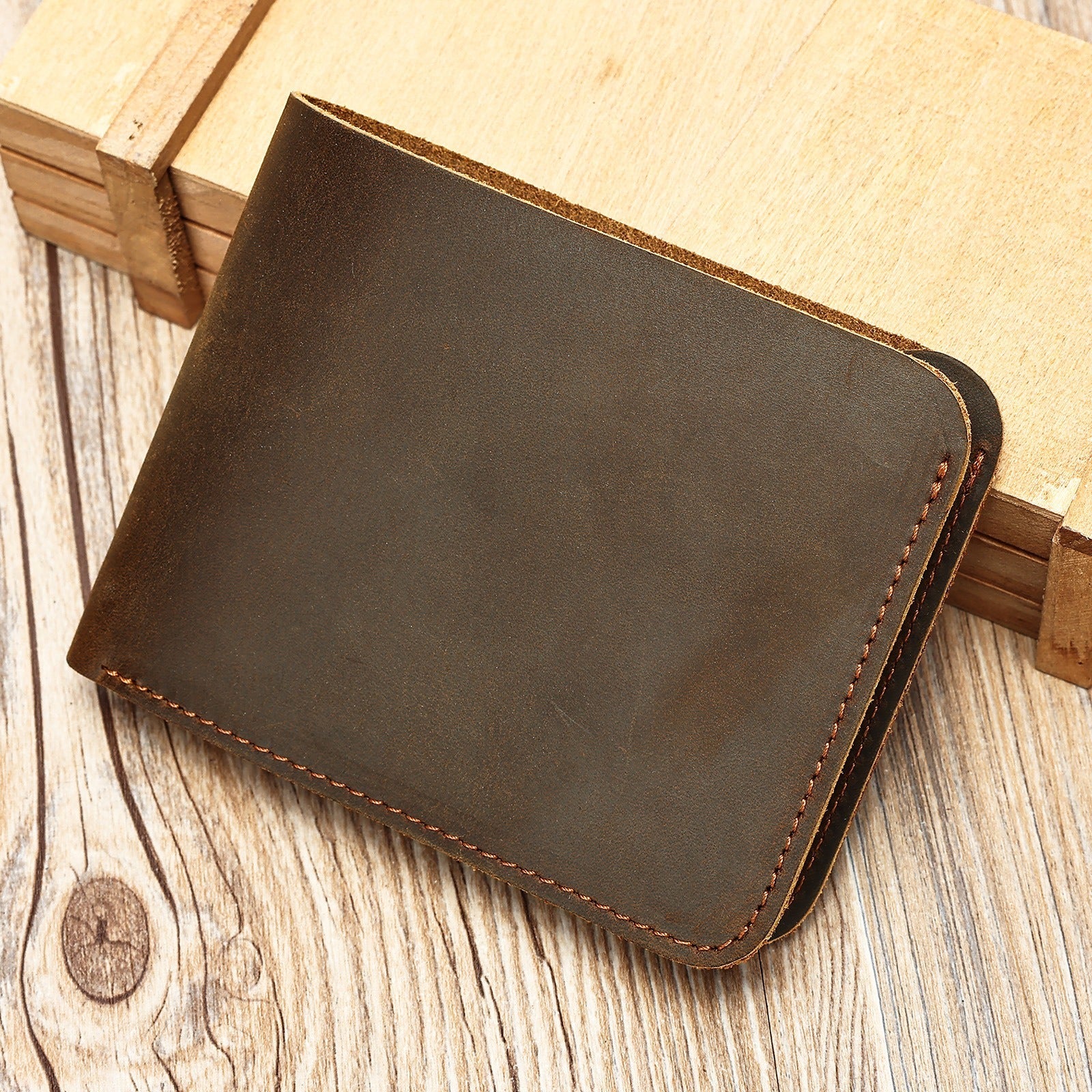 Dark brown men's wallet, closed detail
