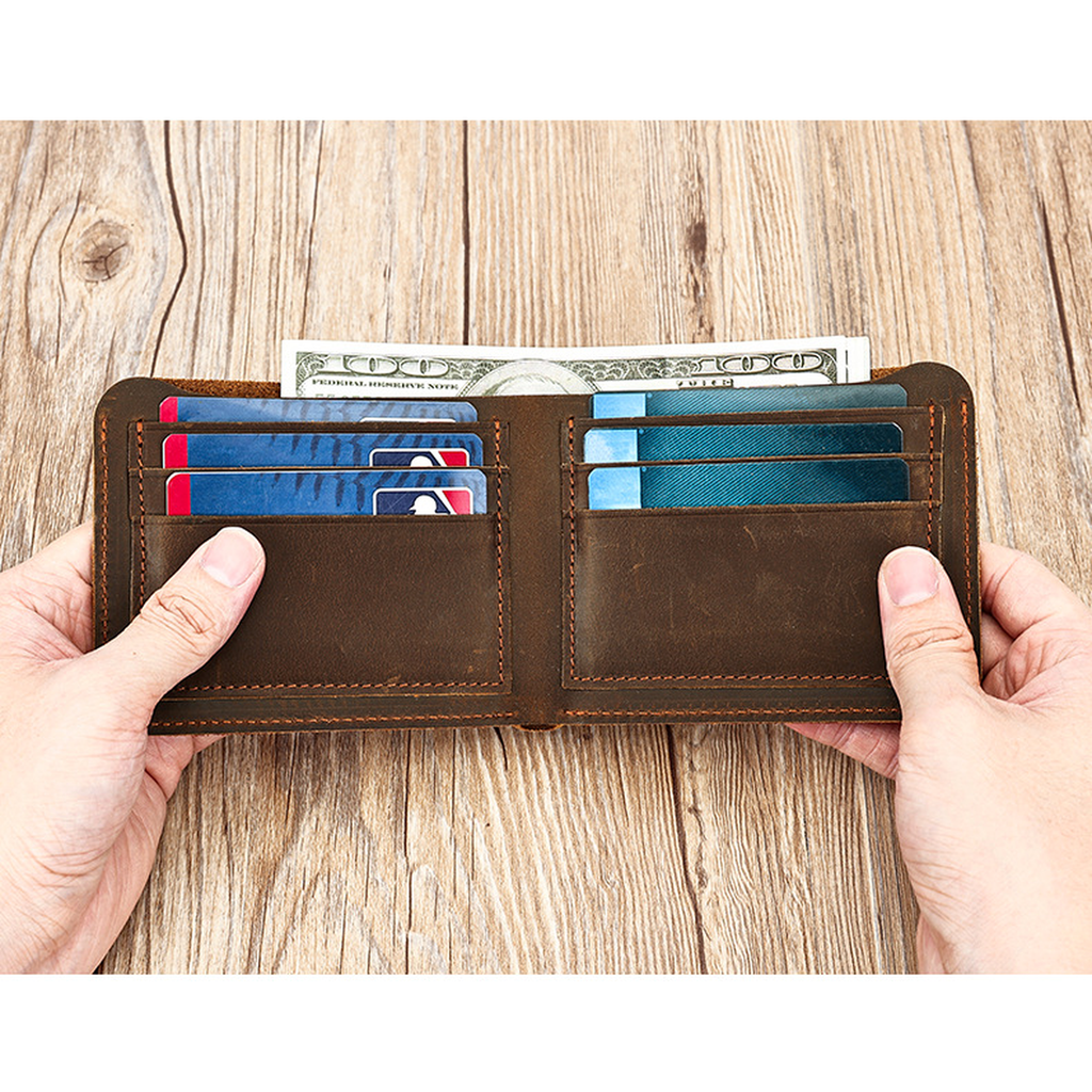 Dark brown men's wallet, open with cash and cards