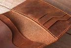 Brown men's bifold wallet, closed view