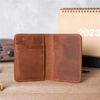 Brown men's bifold wallet, flat lay